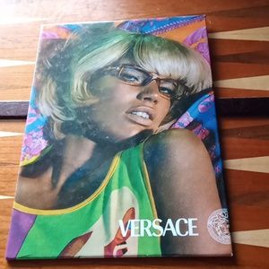 Printed Versace Advertising sign for eyeglasses from 2004. Made in Italy